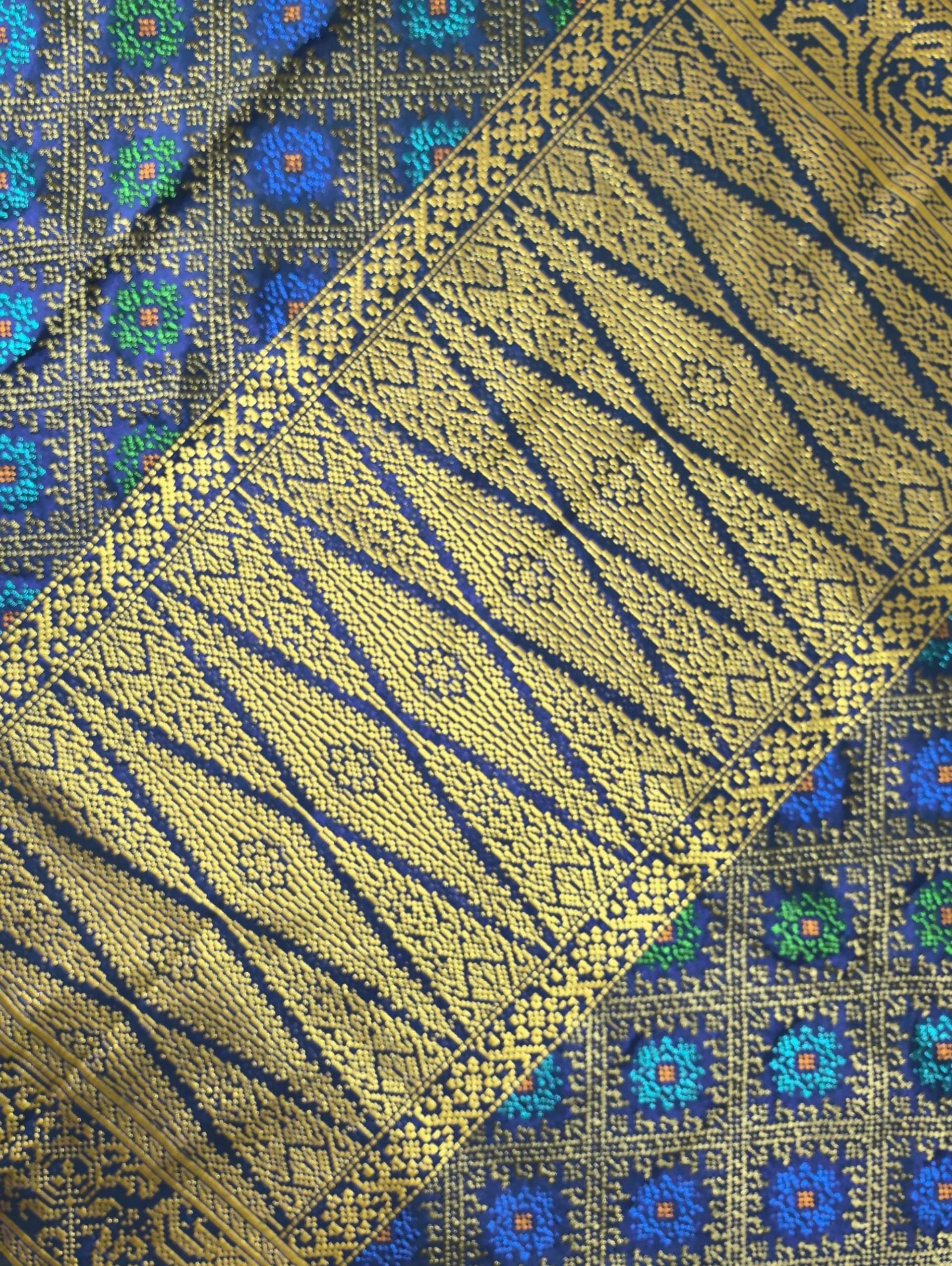 Kain Asli Brunei Si Pugut - Gambar 3